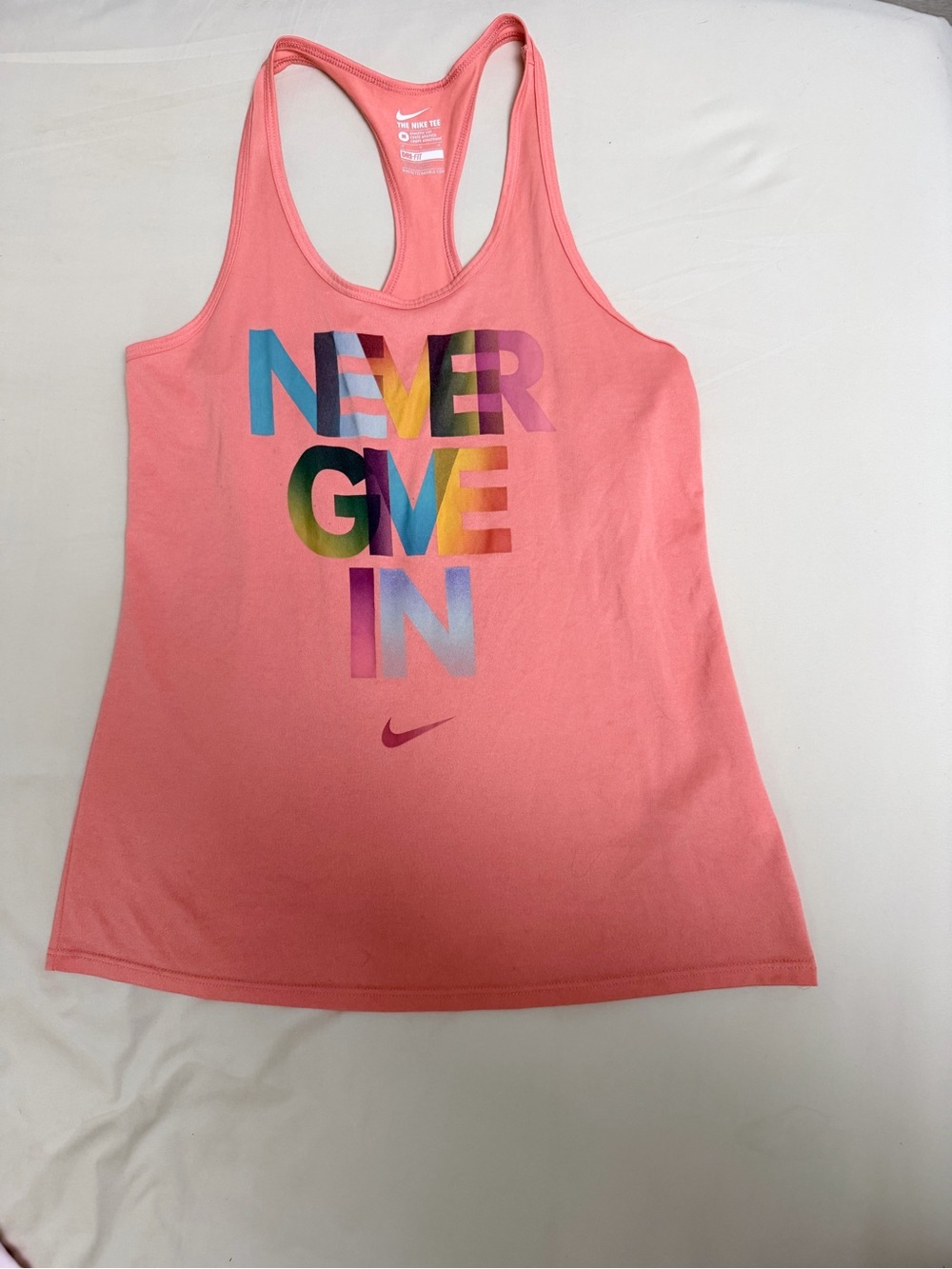 Nike Coral Racerback Tank with Multicolor 'Never Give In' Graphic
